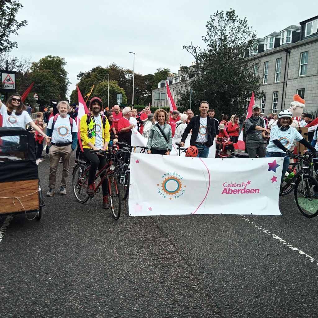 Aberdeen Cycle Forum members at the start of the parade behind our banner and with lots of bikes