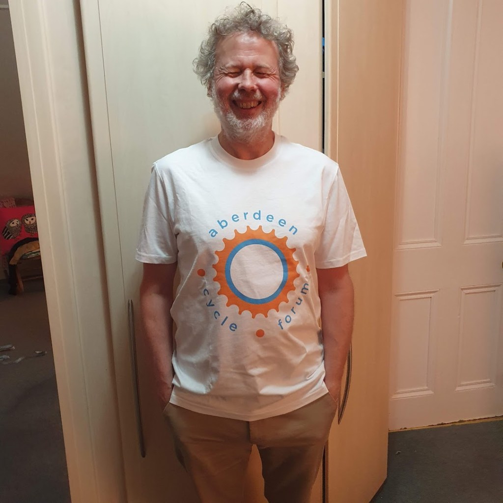 Ben wearing the white tshirt with Aberdeen Cycle Forum logo on the front.