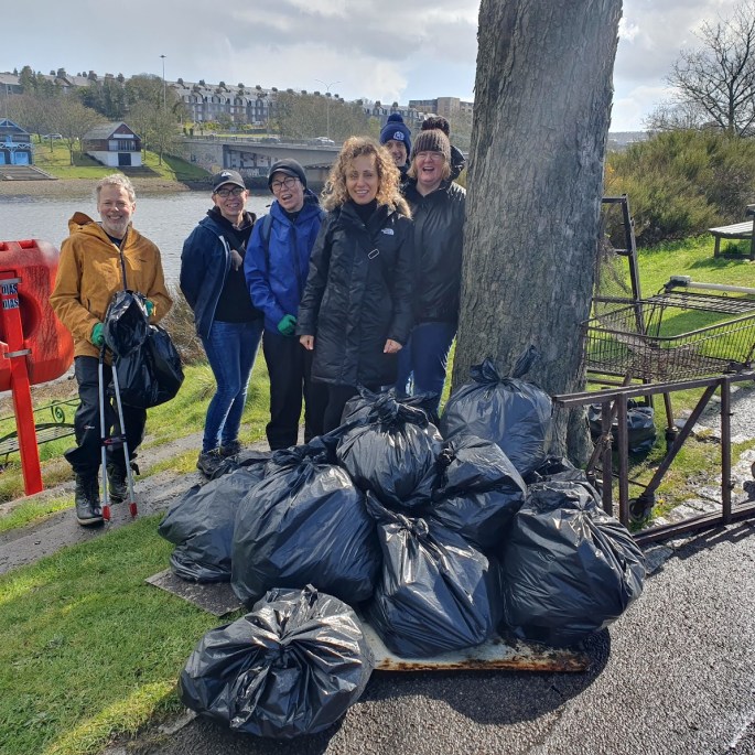 Litter pickers overlooking their handiwork